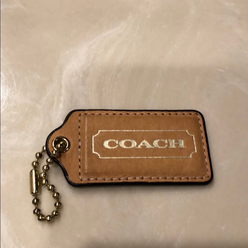 Large Tan Coach Tag